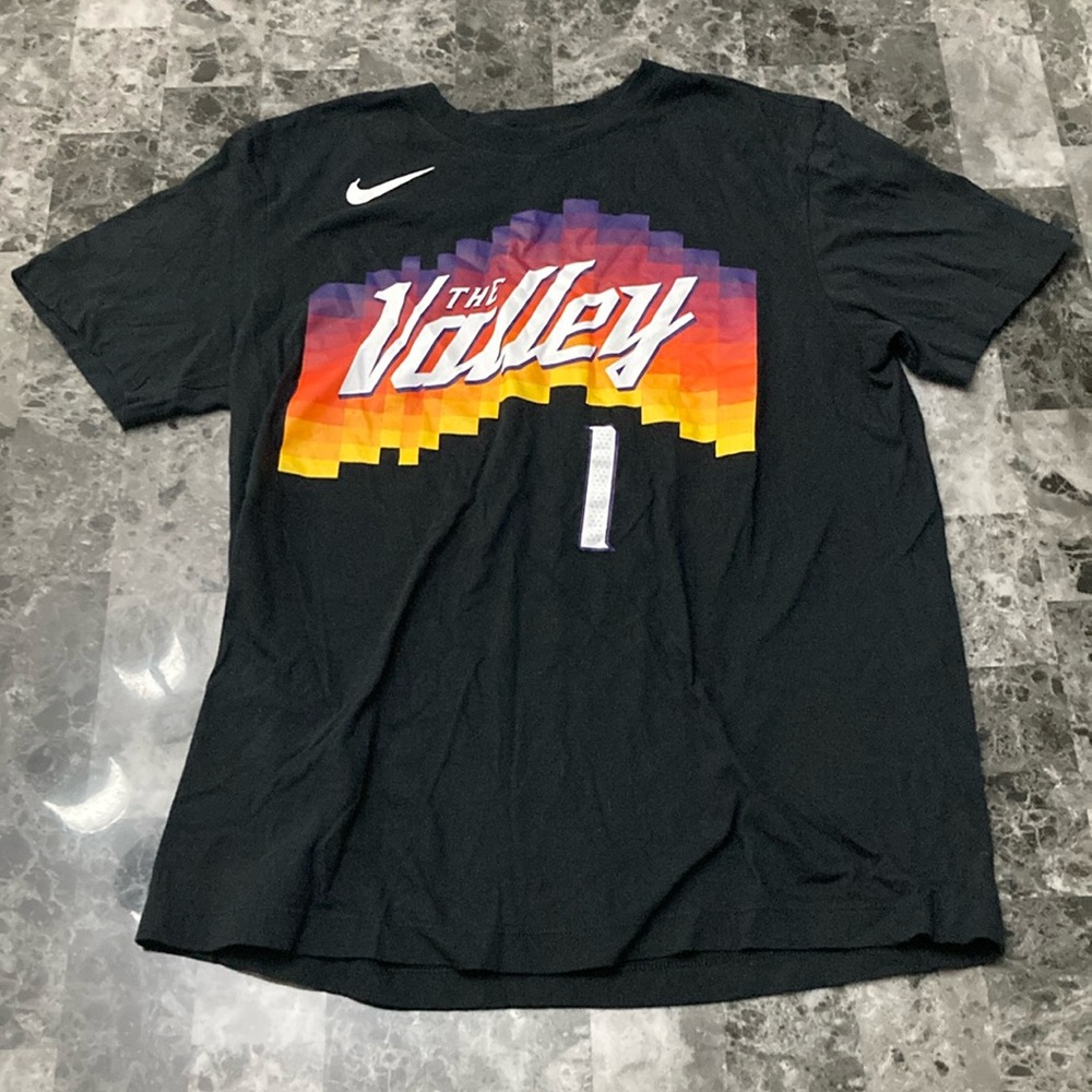 A black Nike Devin Booker shirt/jersey
